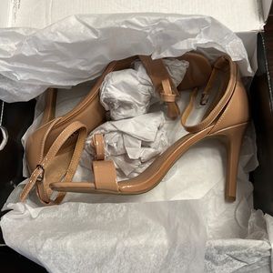 Never worn still in box Torrid Wide Width with a 4in heel! Run a little big.